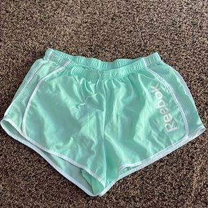 Seafoam green Reebok shorts